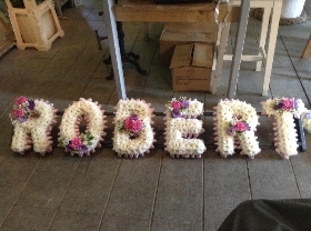 6 letter funeral tribute