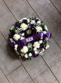 purple and white wreath