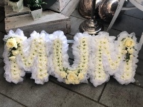 White soft Mum letters