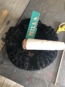 Cigarette in ashtray