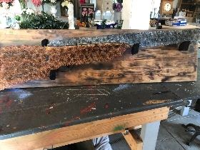Shotgun on wooden board